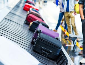 Kofferter på bagasjebånd